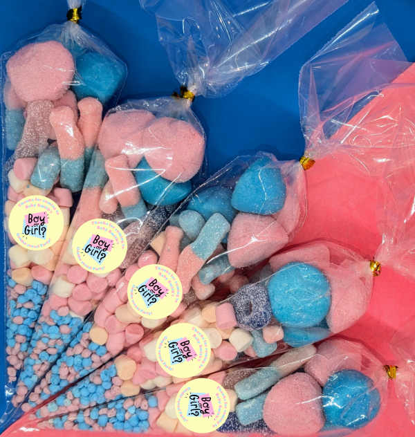 gender reveal boy or girl Sweet cones for neutral baby showers with a variety of blue and pink sweets. Sticker on front says "boy or girl?"