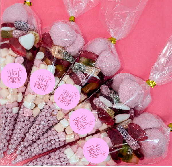 pink themes sweet cones with Hen Party sticker on the front