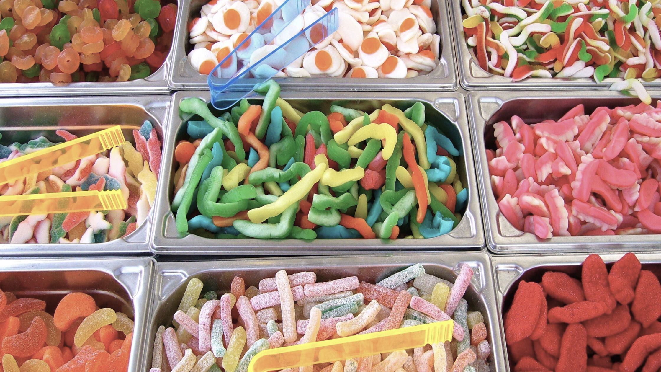 hero background banner showing a selection of sweets for using in sweet cones, sweet pouches and pick n mix